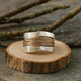 Wave Edge Ring with Layered Golden Wire Center Design