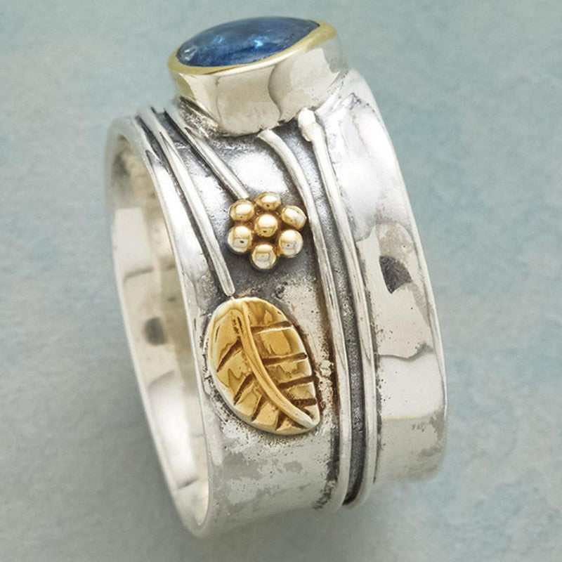 Wide Nature-Inspired Ring with Blue Gem and Golden Accents