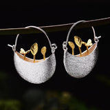 Silver Moon Bowl Earrings with Golden Leaf Sprout Design