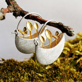Silver Moon Bowl Earrings with Golden Leaf Sprout Design