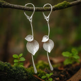 Silver Leaf Drop Earrings with Nature Goddess Design