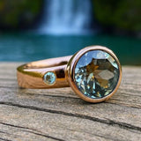 Rose Gold Ring with Blue-Green Solitaire Gemstone Accent