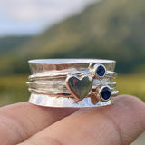 Hammered Heart Spinner Ring with Blue Gemstone Accents