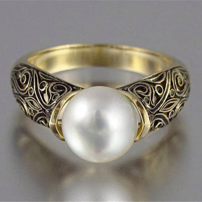 Vintage Gold Pearl Ring with Nature-Inspired Filigree Design