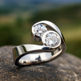 Elegant Bypass Ring with Two Round Brilliant Diamonds