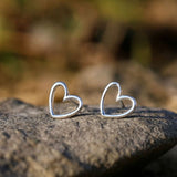 Minimalist Open Heart Stud Earrings in Polished Silver