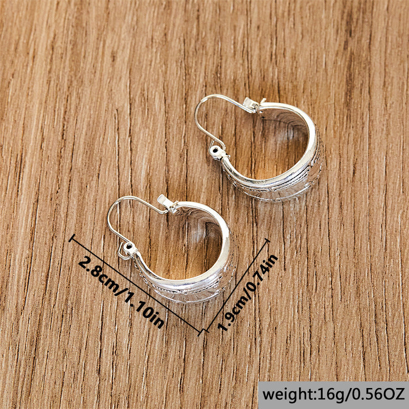 Tribal Guardian Hoop Earrings with Ancient Patterns