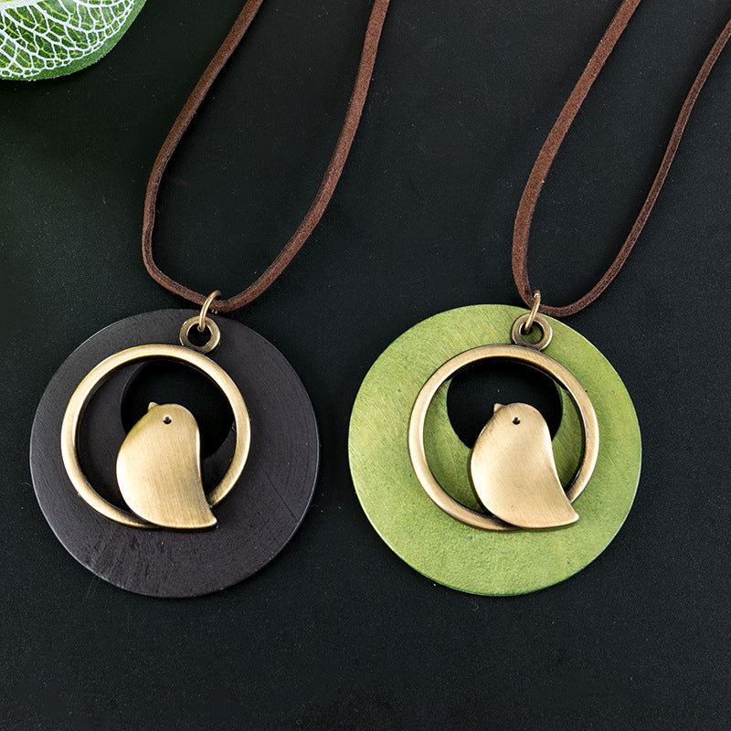 Minimalist Bird Pendant Necklace with Wooden Circle Design