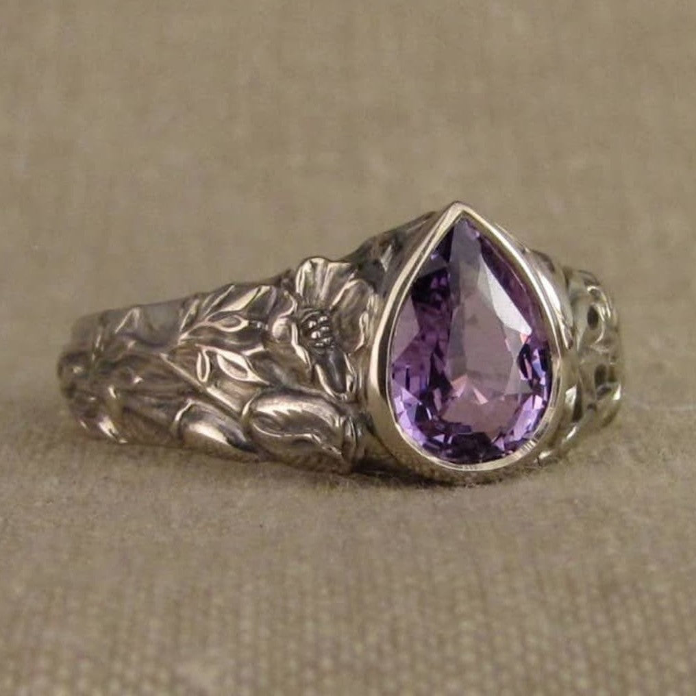 Vintage Floral Ring with Teardrop Purple Gemstone Design