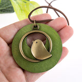 Minimalist Bird Pendant Necklace with Wooden Circle Design