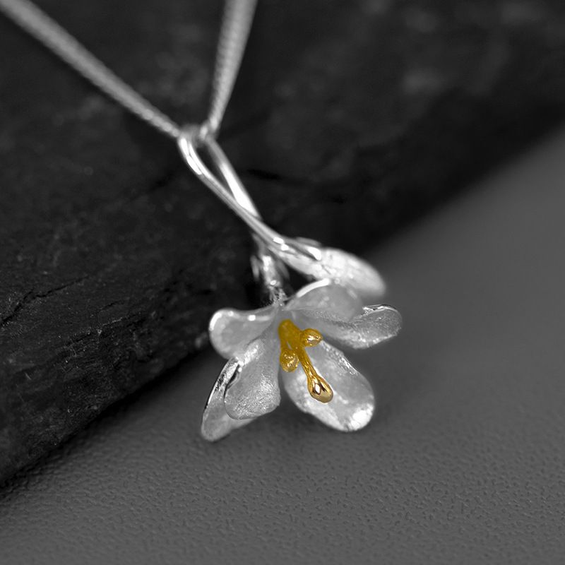 Floral Pendant Necklace in Gold and Silver