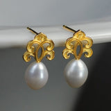 Sacred Pearl Drop Earrings with Mystical Scrollwork Charm