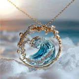 Golden Ocean Wave Pendant with Sparkling Crystal Accents