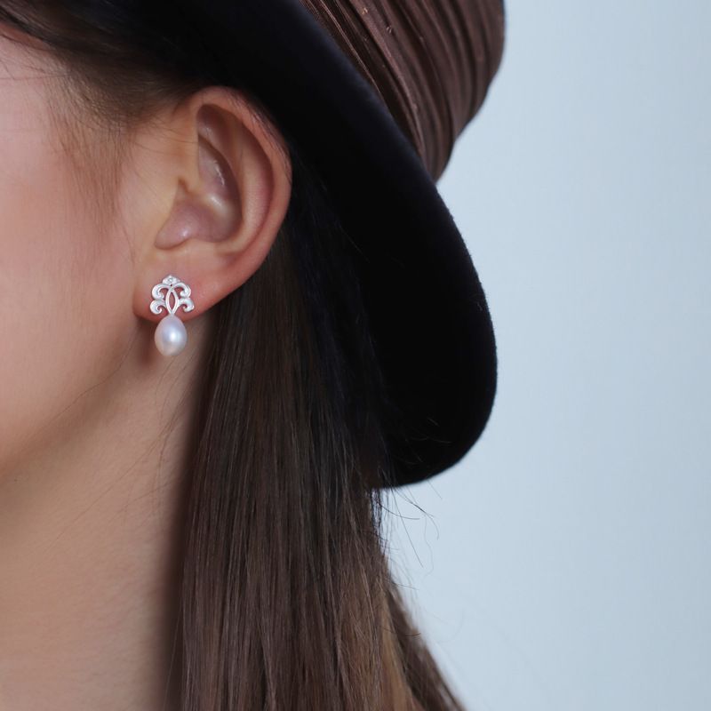 Sacred Pearl Drop Earrings with Mystical Scrollwork Charm