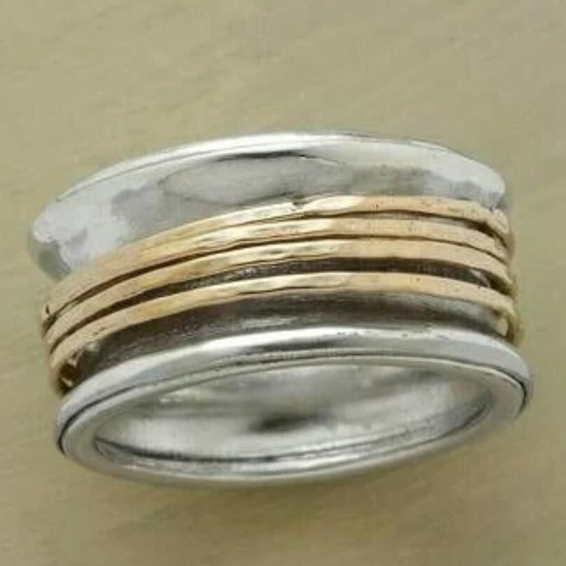 Hammered Spinner Ring in Sterling Silver and Brass