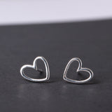 Minimalist Open Heart Stud Earrings in Polished Silver
