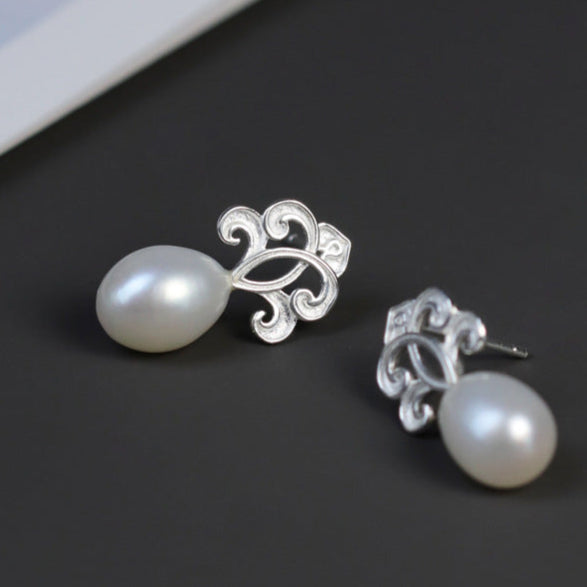 Sacred Pearl Drop Earrings with Mystical Scrollwork Charm