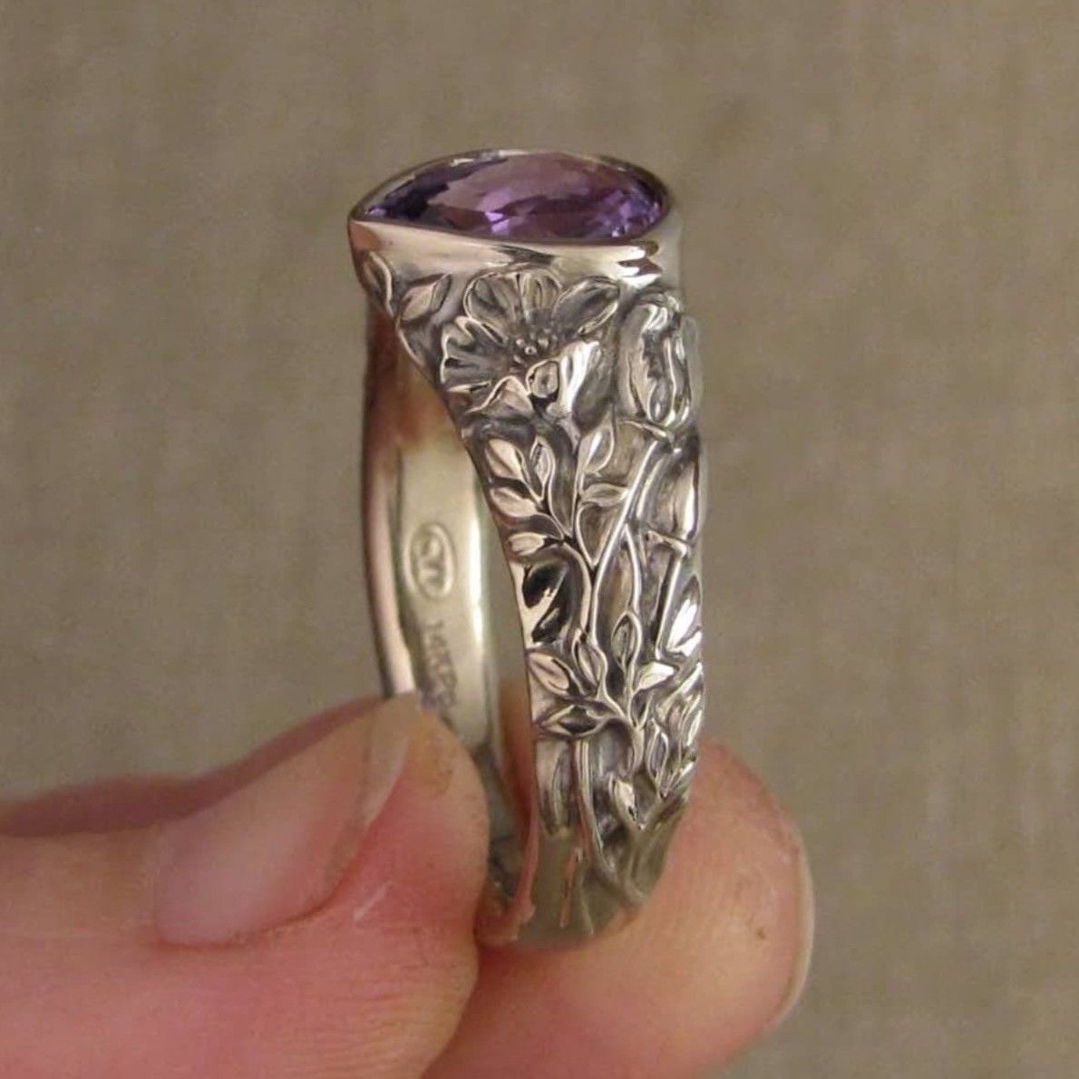 Vintage Floral Ring with Teardrop Purple Gemstone Design