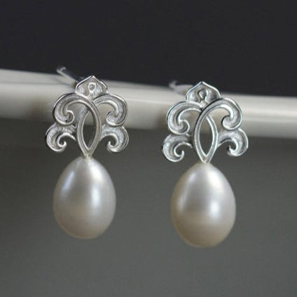 Sacred Pearl Drop Earrings with Mystical Scrollwork Charm