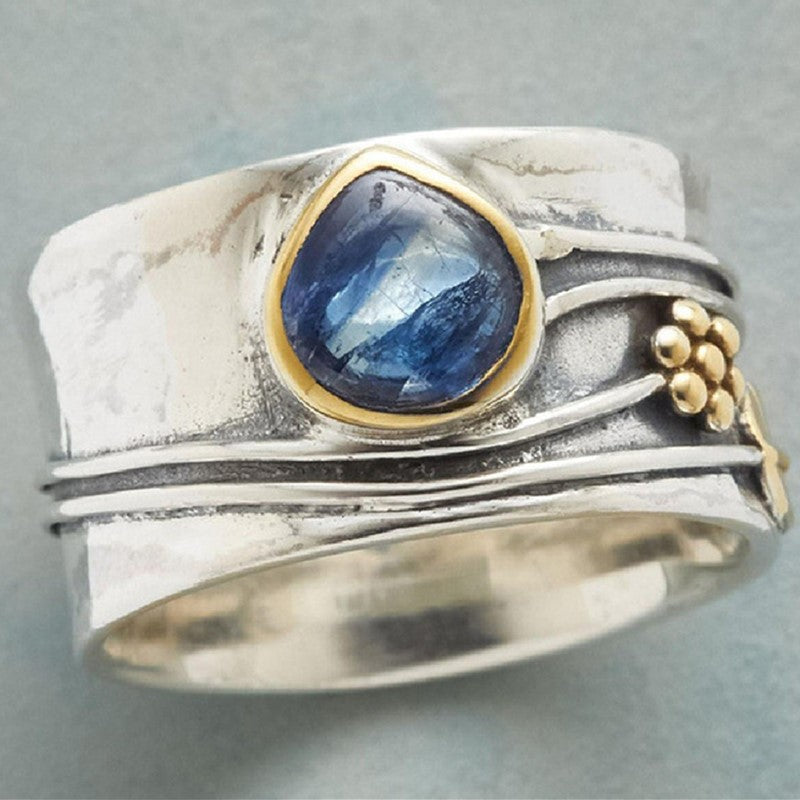 Wide Nature-Inspired Ring with Blue Gem and Golden Accents