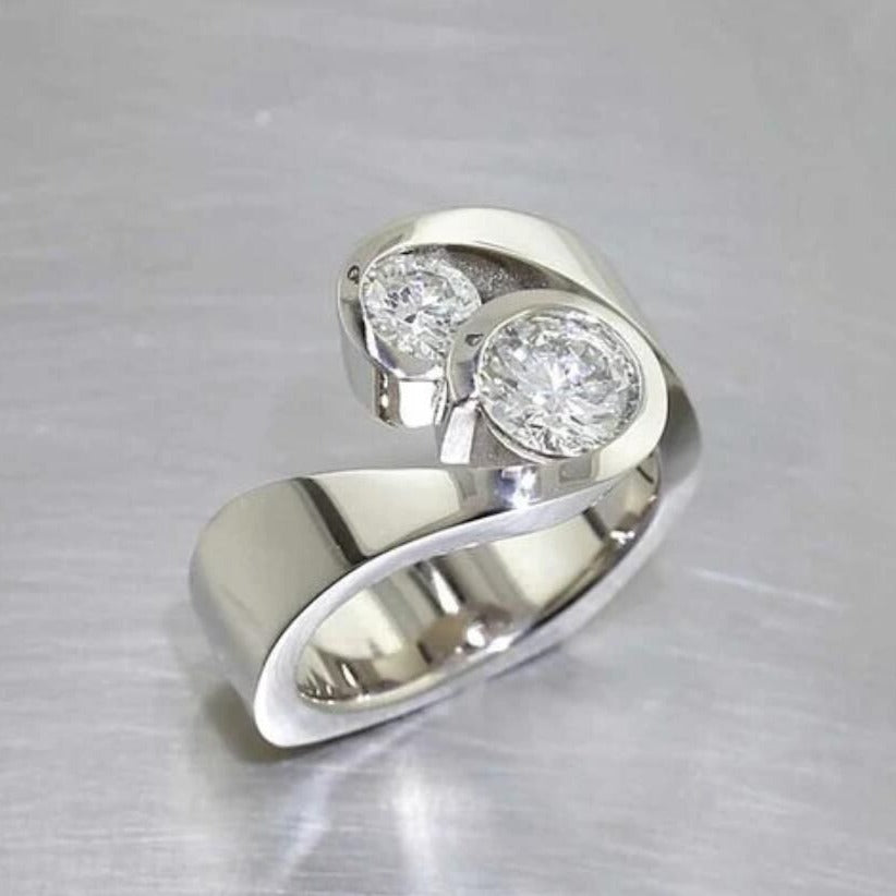 Elegant Bypass Ring with Two Round Brilliant Diamonds