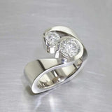 Elegant Bypass Ring with Two Round Brilliant Diamonds