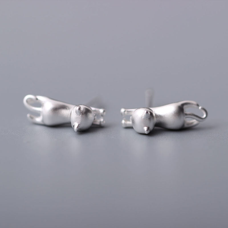 Stretching Cat Studs for Calm Energy and Quiet Magic