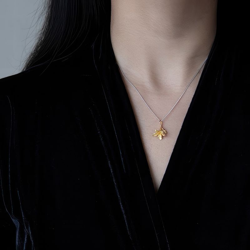 Floral Pendant Necklace in Gold and Silver