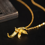 Moonflower Crescent Necklace in Gold and Silver Harmony