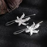 Celestial Bloom Drop Earrings with Star Petals
