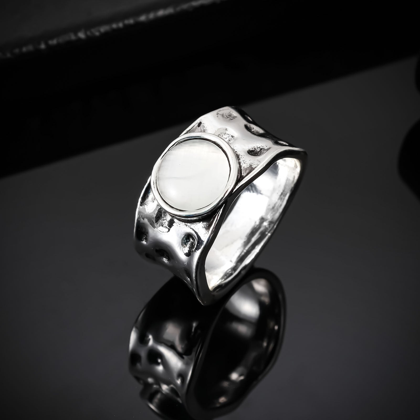 Organic Textured Ring with White Gem and Sculpted Band