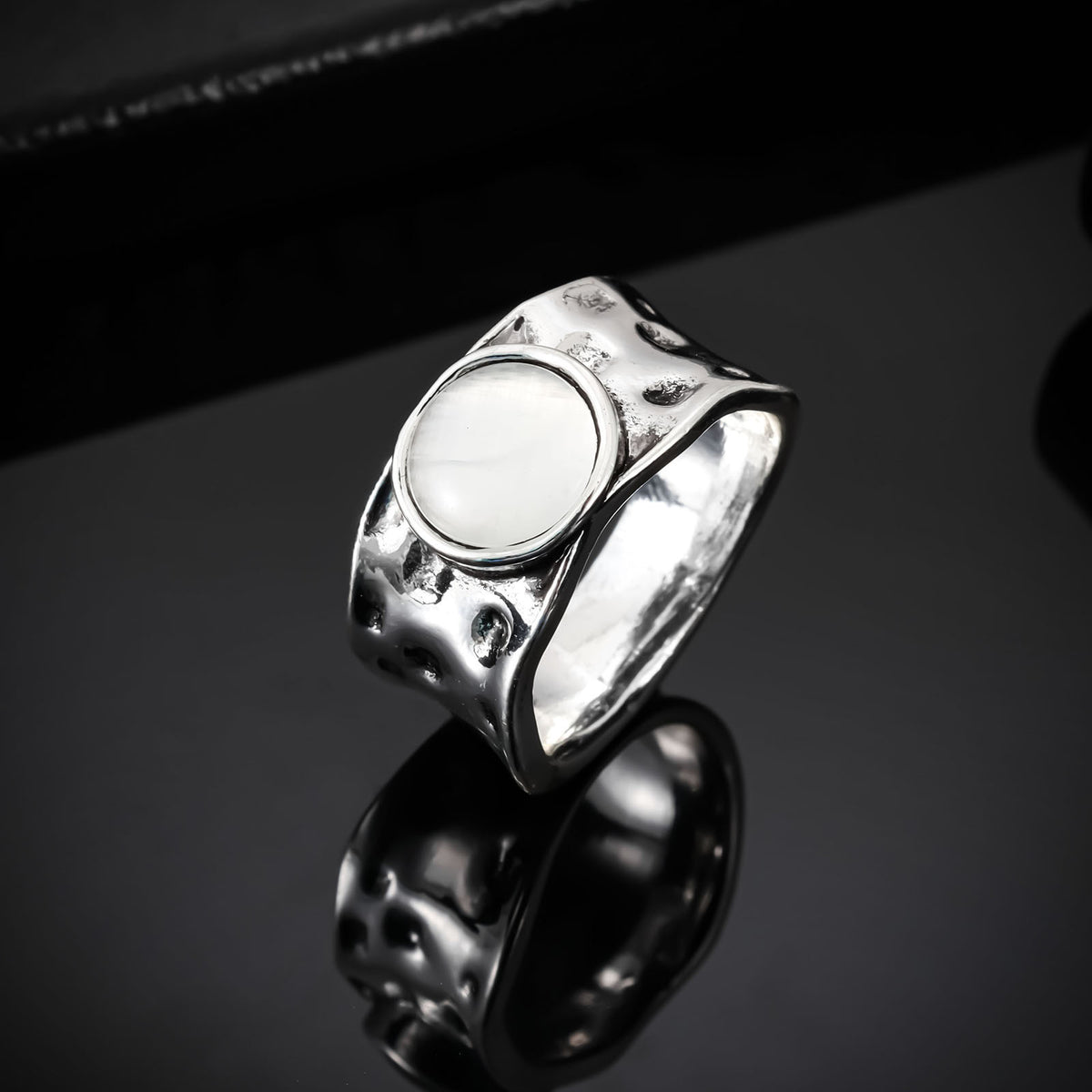Organic Textured Ring with White Gem and Sculpted Band