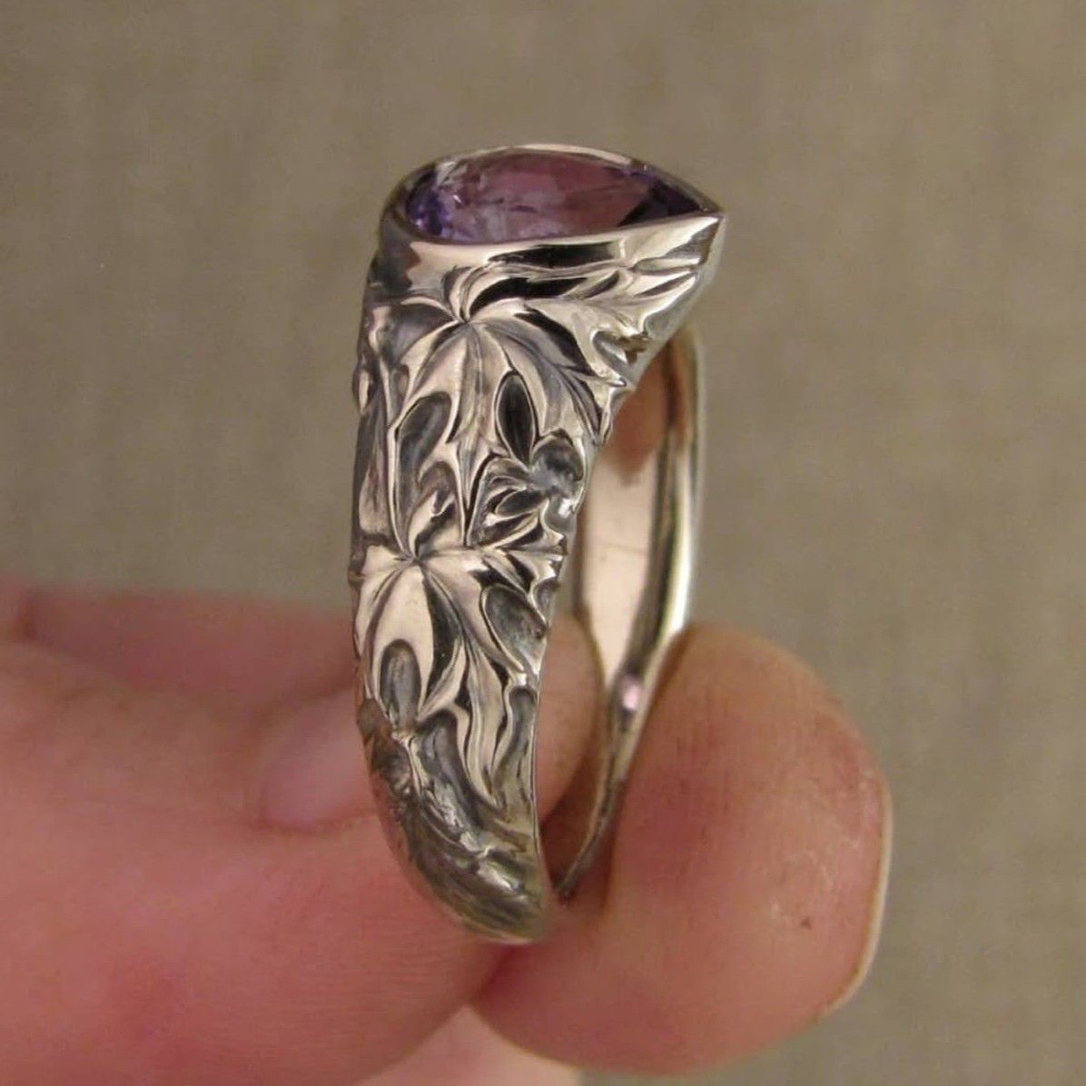 Vintage Floral Ring with Teardrop Purple Gemstone Design