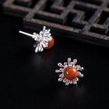 Sunburst Radiance Stud Earrings with Healing Energy Core