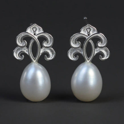 Sacred Pearl Drop Earrings with Mystical Scrollwork Charm