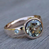 Rose Gold Ring with Blue-Green Solitaire Gemstone Accent
