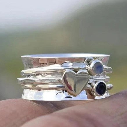 Hammered Heart Spinner Ring with Blue Gemstone Accents