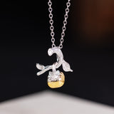 Golden Fruit Amulet – Enchanted Vine Pendant