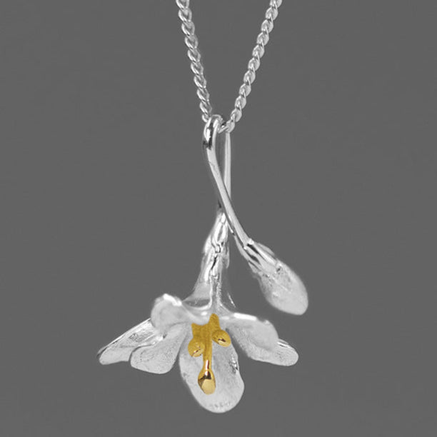 Floral Pendant Necklace in Gold and Silver