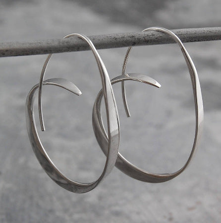 Minimalist Gold Spiral Hoop Earrings with Organic Flow