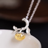 Golden Fruit Amulet – Enchanted Vine Pendant